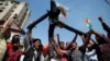 Pakistani protesters shout anti-Indian slogans in Hyderabad, Pakistan, Feb. 26, 2019.