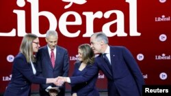 Кандидати на посаду лідера Ліберальної партії Канади у день дебатів в лютому напередодні виборів, що триватимуть у неділю, 9 березня. REUTERS/Evan Buhler