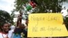 FILE - Kenyan gay and lesbian organizations demonstrate against harsh anti-LGBTQ+ laws, in Nairobi on Feb. 7, 2014. Nigerian lawmakers on July 10, 2024, criticized a multinational agreement with the European Union that some say could promote same-sex relationships.
