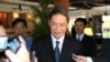 FILE - Zhang Zhijun, director of the Taiwan Affairs Office (TAO), is asked for comments by journalists after meeting with Taiwan's former Vice President Vincent Siew in Bali, Indonesia, Sunday, Oct. 6, 2013. 