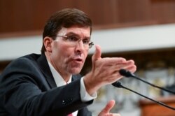 Defense Secretary nominee Mark Esper testifies before a Senate Armed Services Committee hearing on his nomination in Washington, July 16, 2019.