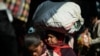 18 dead in India stampede to catch trains to Hindu mega-festival