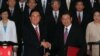 Chen Yunlin, left, shakes hands with Chiang Pin-kung, after signing investment protection pact, Taipei, Taiwan, August 9, 2012. 