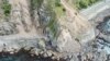 Landslides block State Highway One near Kaikoura on the upper east coast of New Zealand's South Island following an earthquake, Nov. 14, 2016.