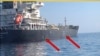 Image released by the U.S. military's Central Command, shows damage and a suspected mine on the Kokuka Courageous in the Gulf of Oman near the coast of Iran, June 13, 2019.