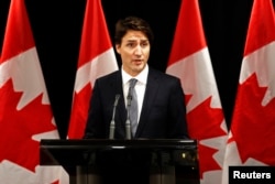 FILE - Canadian Prime Minister Justin Trudeau will travel to Washington, D.C., this week to meet with President Barack Obama.