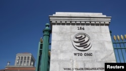 FILE - A logo is pictured on the headquarters of the World Trade Organization (WTO) in Geneva, Switzerland, June 2, 2020. 