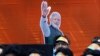 FILE - India’s Bharatiya Janata Party workers listen to Prime Minister Narendra Modi addressing them via video conference in New Delhi, India, Feb.28, 2019.
