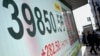 Stock market today: Asian shares mixed after Wall Street slips, led by tech giants 