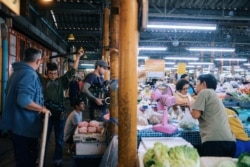 Champ Ensminger and his crews in Chiang Mai, Thailand, during the filming of Yai Nin, Ensminger's short documentary about his grandmother, Ninlawan Pinyo.