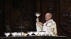 Priest Olivier Ribadeau Dumas celebrates a second mass, open to the public, at the Notre-Dame de Paris cathedral on the day of its re-opening, in Paris on December 8, 2024.