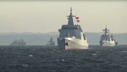 중국과 러시아 해군 함정들이 일본해(동해)상에서 합동 훈련을 진행하고 있다. 러시아 국방부가 18일 공개한 영상 속 장면.