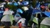 AS Tambahkan Kota Keenam dalam Program Permulangan Migran Meksiko
