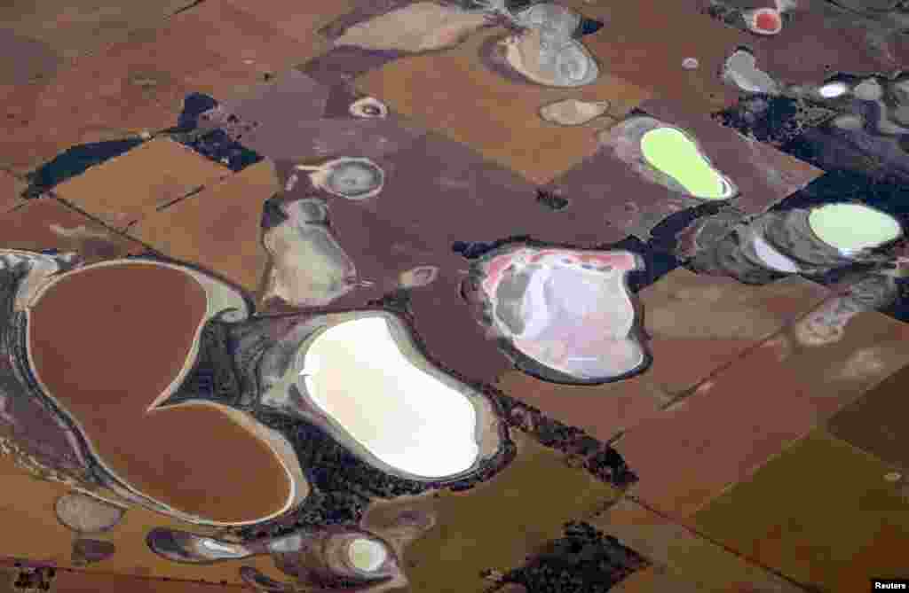 Salt pans and dams can be seen in farming areas located in the southern region of Western Australian, near the city of Perth, Australia.
