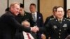 Acting U.S. Secretary of Defense Patrick Shanahan, left, shakes hands with Chinese Minister of National Defense Gen. Wei Fenghe on the sidelines of the 18th International Institute for Strategic Studies Shangri-la Dialogue, Singapore, June 1, 2019. 