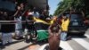 Supporters of opposition member Venancio Mondlane protest during the inauguration of the ruling Frelimo party's leader Daniel Chapo as Mozambique's newly elected President in Maputo, Mozambique, Jan. 15, 2025. 