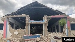 The remains of the St. Famille du Toirac church is seen after a 7.2 magnitude quake hit during a funeral service, in Toirac, Haiti August 16, 2021. REUTERS/Laura Gottesdiener