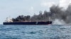 Kapal tanker berbendera Singapura Hafnia Nile terbakar di Tanjung Sedili, dekat Singapura. (Foto: AFP)