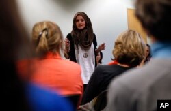 Syrian-American poet Amal Kassir recites her work during a gathering where immigrants from hostile environments spoke about their lives, at the YWCA in Boulder, Colorado, April 19, 2016.
