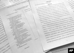 A portion of the Feb. 16, 2018, indictment against Russia's Internet Research Agency is photographed in Washington, March 15, 2018.