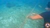 Philippines Removes China’s Floating Barrier at South China Sea Lagoon 