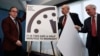 From left, Lawrence Krauss, theoretical physicist, chair of the Bulletin of the Atomic Scientists Board of Sponsors; Thomas Pickering, co-chair of the International Crisis Group and former U.S. ambassador to Russia; and David Titley, a nationally known expert in the field of climate, the Arctic, and national security, unveil the Doomsday Clock during a news conference at the National Press Club in Washington, Jan. 26, 2017.