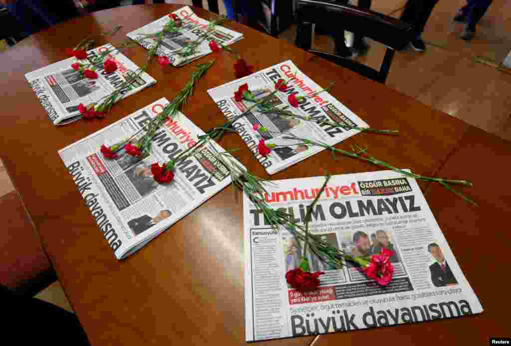 Carnations and today's copies are seen in the newsroom of Cumhuriyet newspaper, an opposition secularist daily, in Istanbul, Turkey.