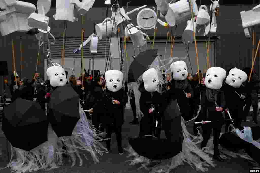 Participants in the Processional Arts Workshops' performance of Reverie get ready for the Greenwich Village Halloween Parade in Manhattan, New York, Oct. 31, 2016.
