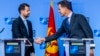Crnogorski predsjednik Jakov Milatović rukuje se da generalnim sekretarom NATO-a Markom Ruteom (Foto: Kabinet predsjednika Crne Gore, NATO)