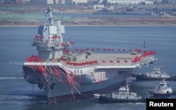 China's first domestically built aircraft carrier is seen during its launching ceremony in Dalian, Liaoning province, China, April 26, 2017.