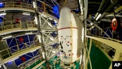 FILE - This photo provided by ESA (European Space Agency) shows the Gaia satellite at the Kourou space base, French Guiana, Dec. 14, 2013.