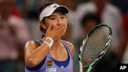 Chinese tennis player Peng Shuai reacts during a tennis match in Beijing, China on Oct. 6, 2009.
