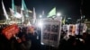 People gather to demand South Korean President Yoon Suk Yeol to step down in front of the National Assembly in Seoul, Dec. 4, 2024. 