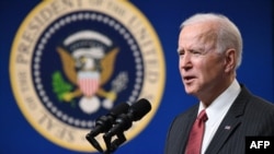 US President Joe Biden speaks about the situation in Myanmar in the South Court Auditorium of the Eisenhower Executive Office Building in Washington, DC, February 10, 2021. (Photo by SAUL LOEB / AFP)