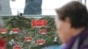 A visitor looks at a map of North Korean towns at the unification observatory in Paju, South Korea, April 25, 2017.