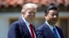 President Donald Trump and Chinese President Xi Jinping walk together after their meetings at Mar-a-Lago, April 7, 2017.