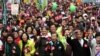 Demonstrators shout slogans and march in protest against the polices of Taiwan's China-friendly President Ma Ying-jeou in Taipei, Taiwan, January 13, 2013. 