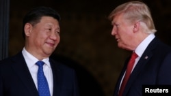 Президент США Дональд Трамп і президент Китаю Сі Цзіньпін