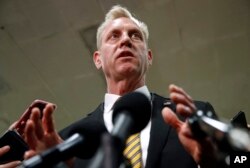 Acting Defense Secretary Patrick Shanahan speaks to reporters after a classified briefing for members of Congress on Iran, May 21, 2019, on Capitol Hill in Washington.