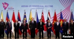 U.S. Secretary of State Mike Pompeo poses with other attendees during an ASEAN-U.S. Ministerial Meeting in Singapore, Aug. 3, 2018.