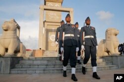 Sri Lankan soldiers march during the tenth anniversary of Sri Lanka's civil war victory at the national war heroes memorial in Colombo, Sri Lanka, May 19, 2019.