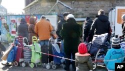 Migranti u redu za hranu u Nemačkoj