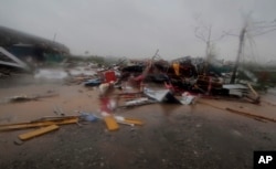 A road is littered with fallen structures in Puri district after Cyclone Fani hit the coastal eastern state of Odisha, India, May 3, 2019.
