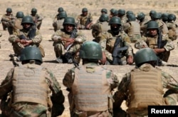 Fighters from predominantly Sunni Arab force take part in a training session before the upcoming battle to recapture Mosul in Bashiqa, Oct. 6, 2016.