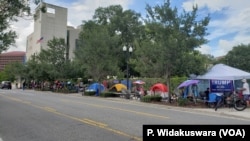 Trump supporters have set up camp since Monday morning, a block away from his reelection rally venue.