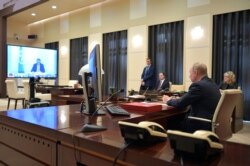 Президент Росії Володимир Путін під час телеконференції з лідерами G20
