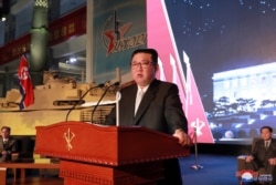 FILE - North Korean leader Kim Jong Un speaks at the Defense Development Exhibition, in Pyongyang, North Korea, in this undated photo released Oct. 12, 2021, by North Korea's Korean Central News Agency.