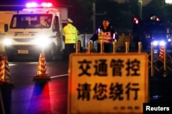 Policajac na poziciji u Čang aveniji, u blizini Velike narodne dvorane u Pekingu, Kina, 26. marta 2018.