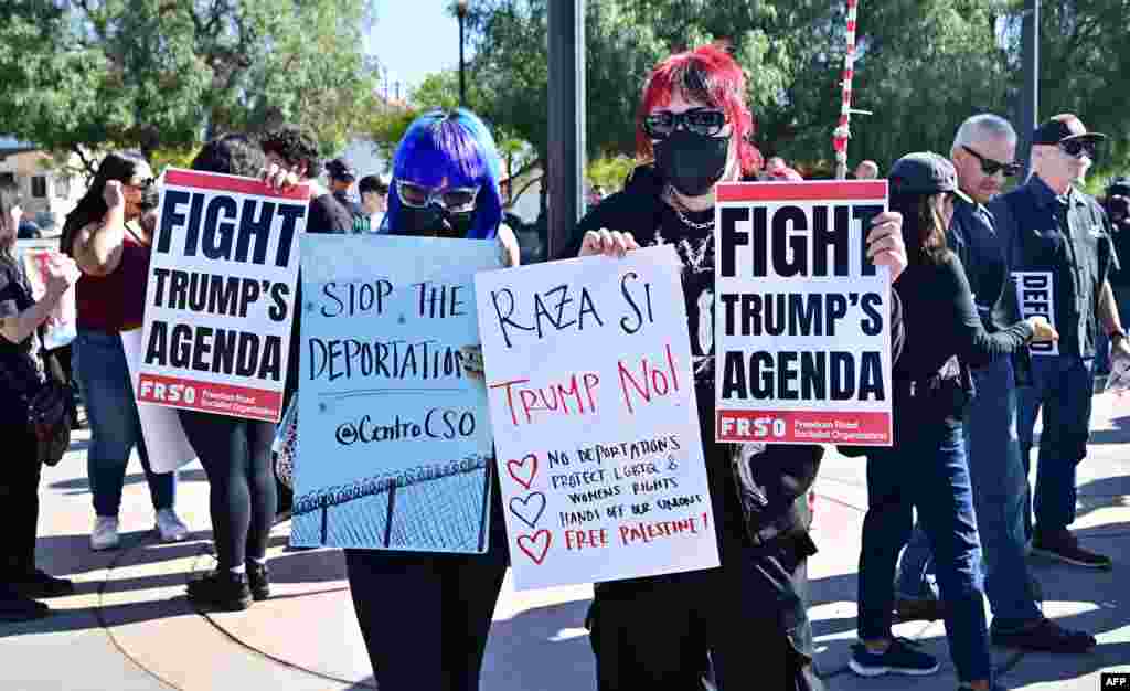 Activists in Los Angeles, California, protest President Donald Trump's plans for large deportations and border enforcement on the day he is inaugurated, Jan. 20, 2025.