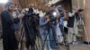 FILE - Afghan journalists attend a press conference by Afghanistan's Minister of Foreign Affairs Amir Khan Muttaqi, in Kabul on September 19, 2024.
